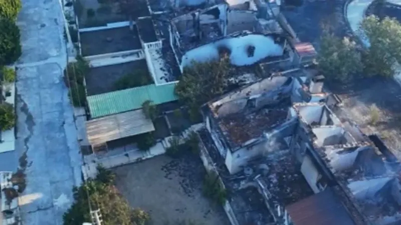 İzmir Seferihisar'daki orman yangınında 345 hanenin bulunduğu sitedeki bazı evler zarar gördü