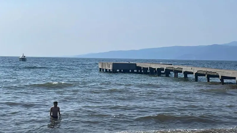 Serinlemek için denize giren genç boğularak can verdi